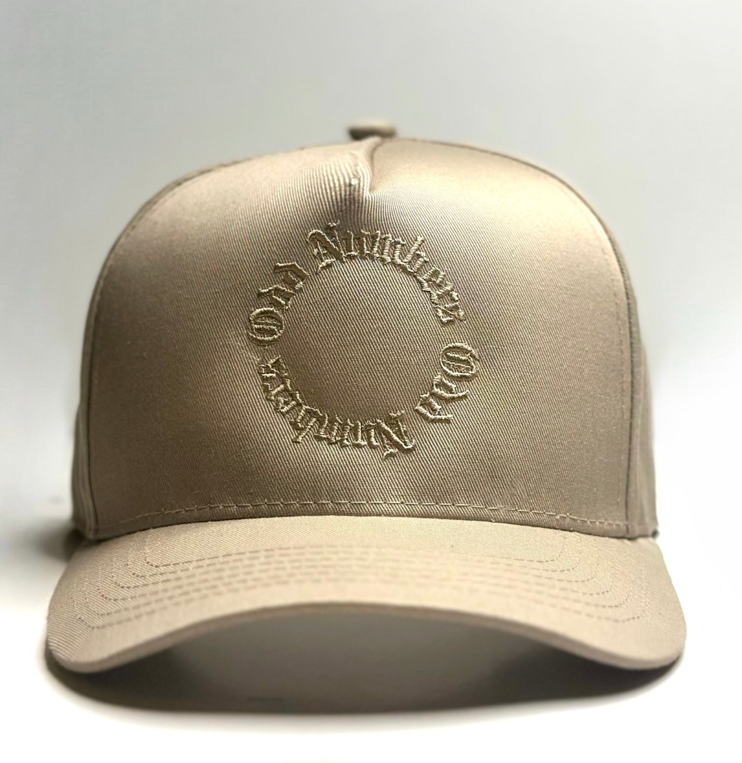 ODD NUMBERS Embroidered Signature Infinite Trucker Hat